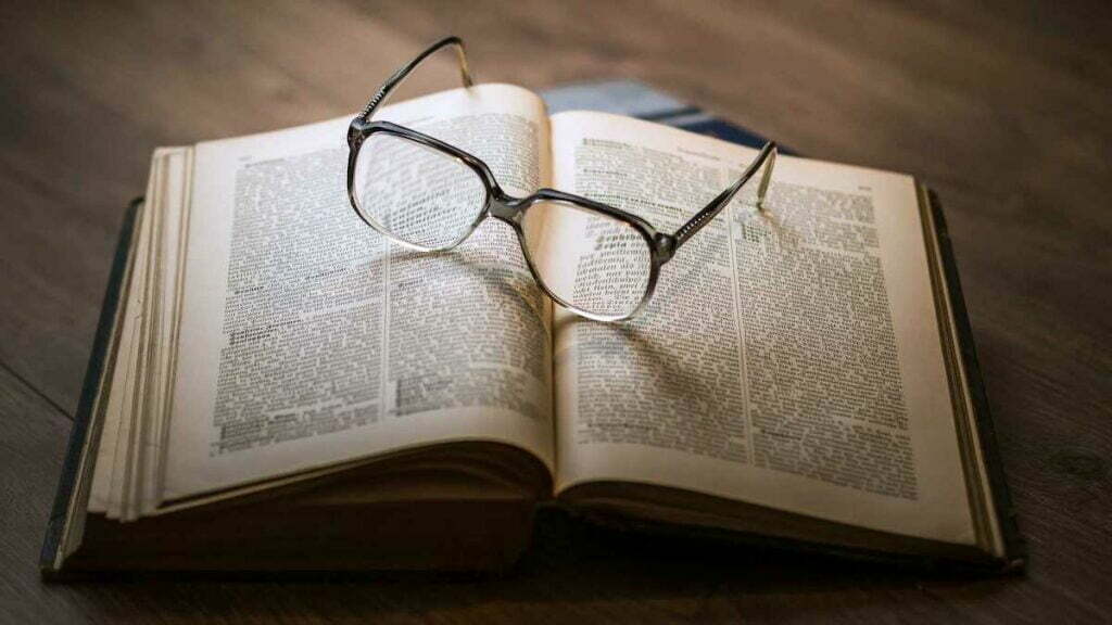 eyeglasses on a book