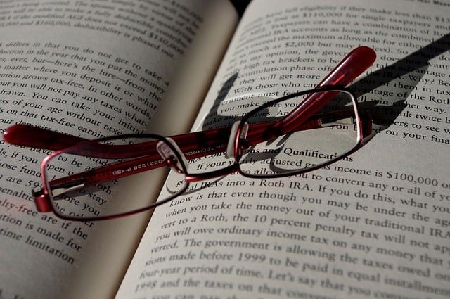 glasses placed on book